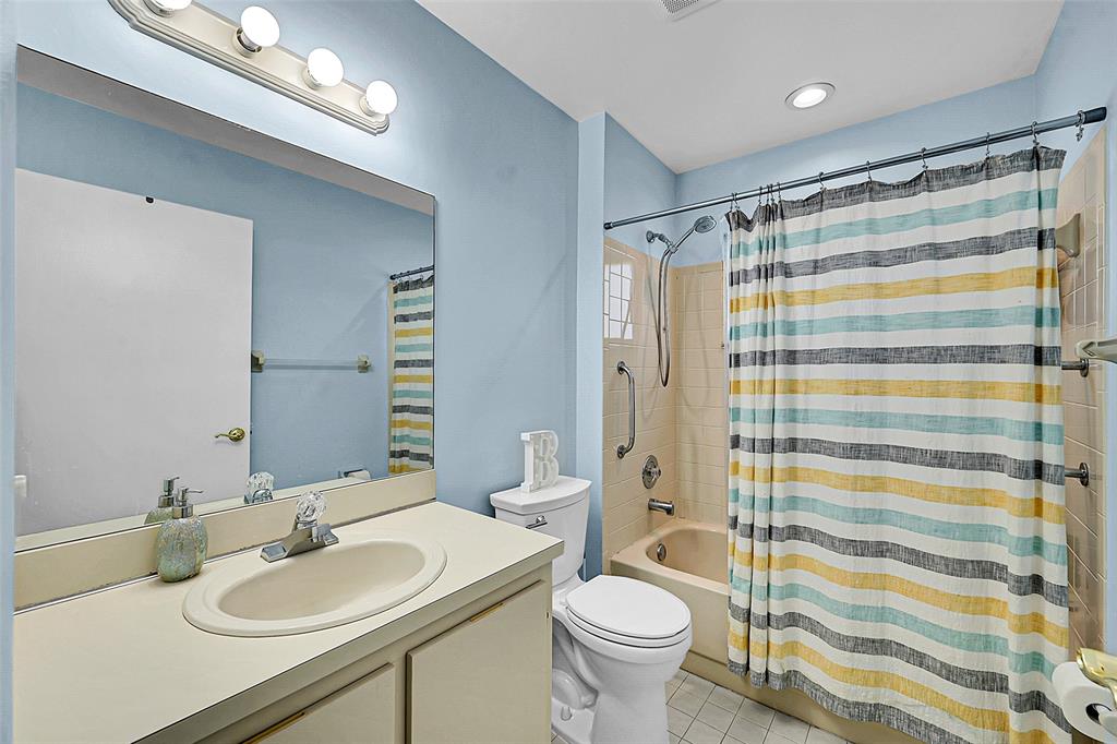 22533 Swordfish Drive Boca Raton, FL 33428 - Photo 25 of 49 a bathroom with a sink toilet and shower