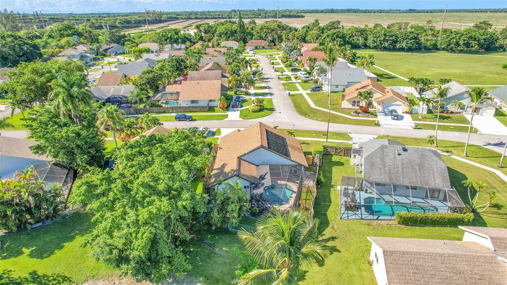 22533 Swordfish Drive Boca Raton, FL 33428 - Photo 34 of 49 an aerial view of residential houses with outdoor space and swimming pool