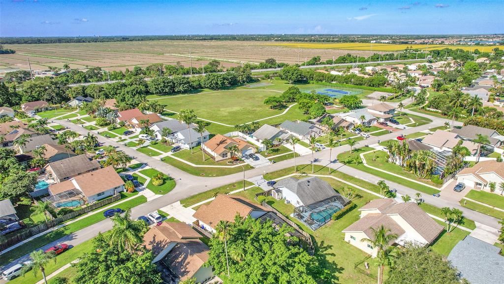 22533 Swordfish Drive Boca Raton, FL 33428 - Photo 35 of 49 an aerial view of residential building and lake