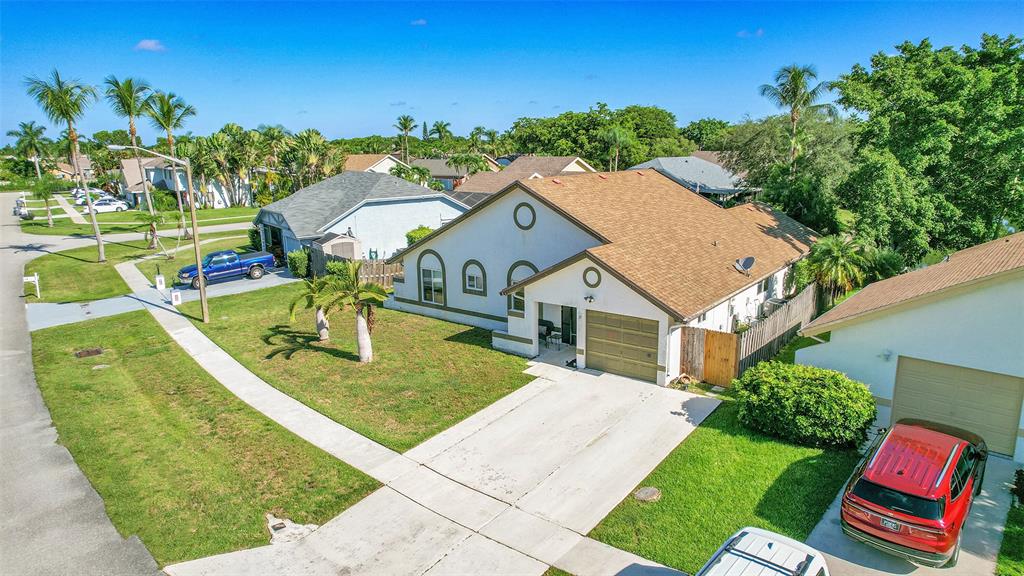 22533 Swordfish Drive Boca Raton, FL 33428 - Photo 43 of 49 an aerial view of a house with a garden