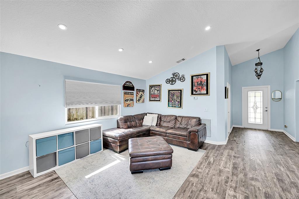 22533 Swordfish Drive Boca Raton, FL 33428 - Photo 8 of 49 a living room with furniture and a window