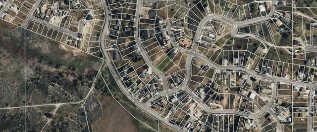 a view of a wooden floor in a yard