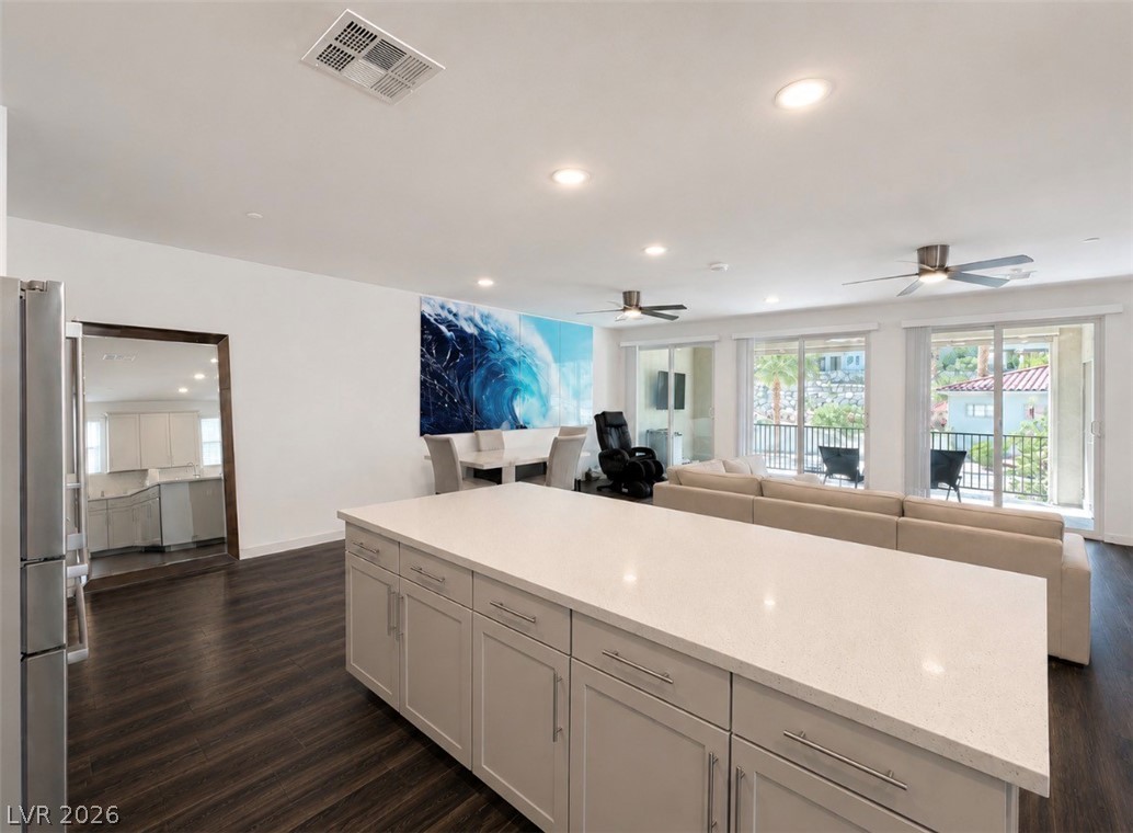 2555 Hampton Road, Unit 4205 Henderson, NV 89052 - Photo 17 of 52 This open concept living area features a spacious kitchen island and expansive views from the balcony.