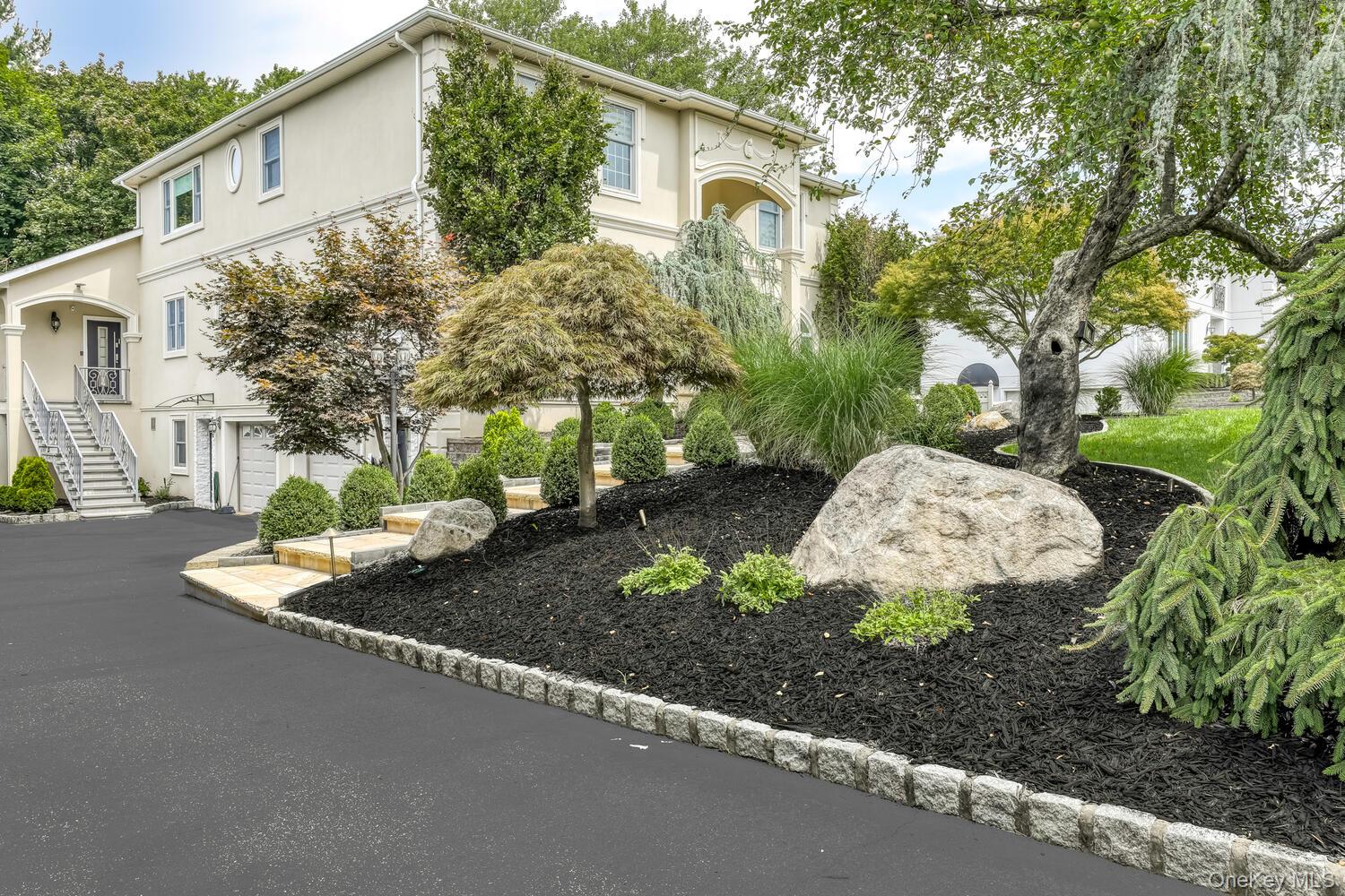 4 Cortland Road Monsey, NY 10952 - Photo 4 of 29 a backyard of a house with a yard and outdoor seating