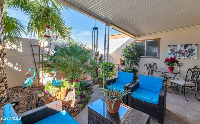 a view of a dining room with furniture window and outdoor kitchen