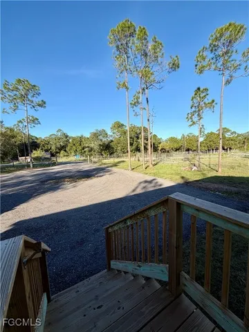 a view of a backyard of a house