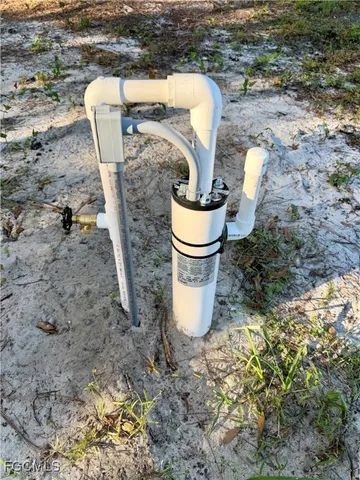 a view of a bathroom with a sink and a mirror