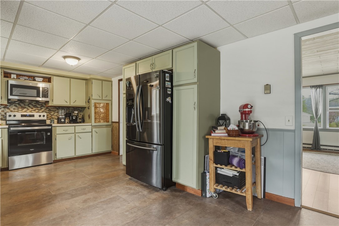 7614 Hardscrabble Road Addison, NY 14801 - Photo 13 of 39 Dining area into kiitchen and living room