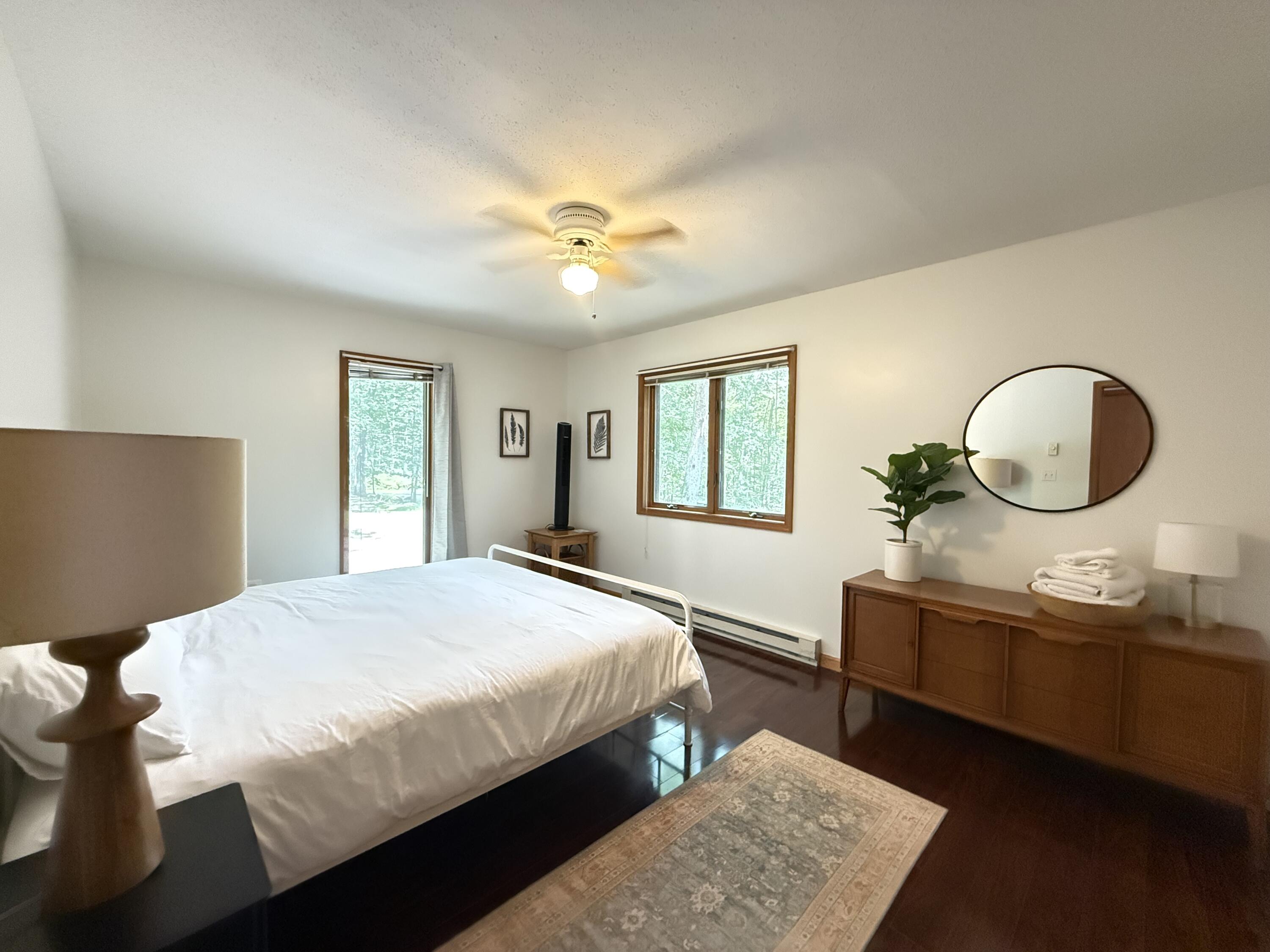 6414 Decker Road Bushkill, PA 18324 - Photo 21 of 65 a bedroom with a large bed and a window