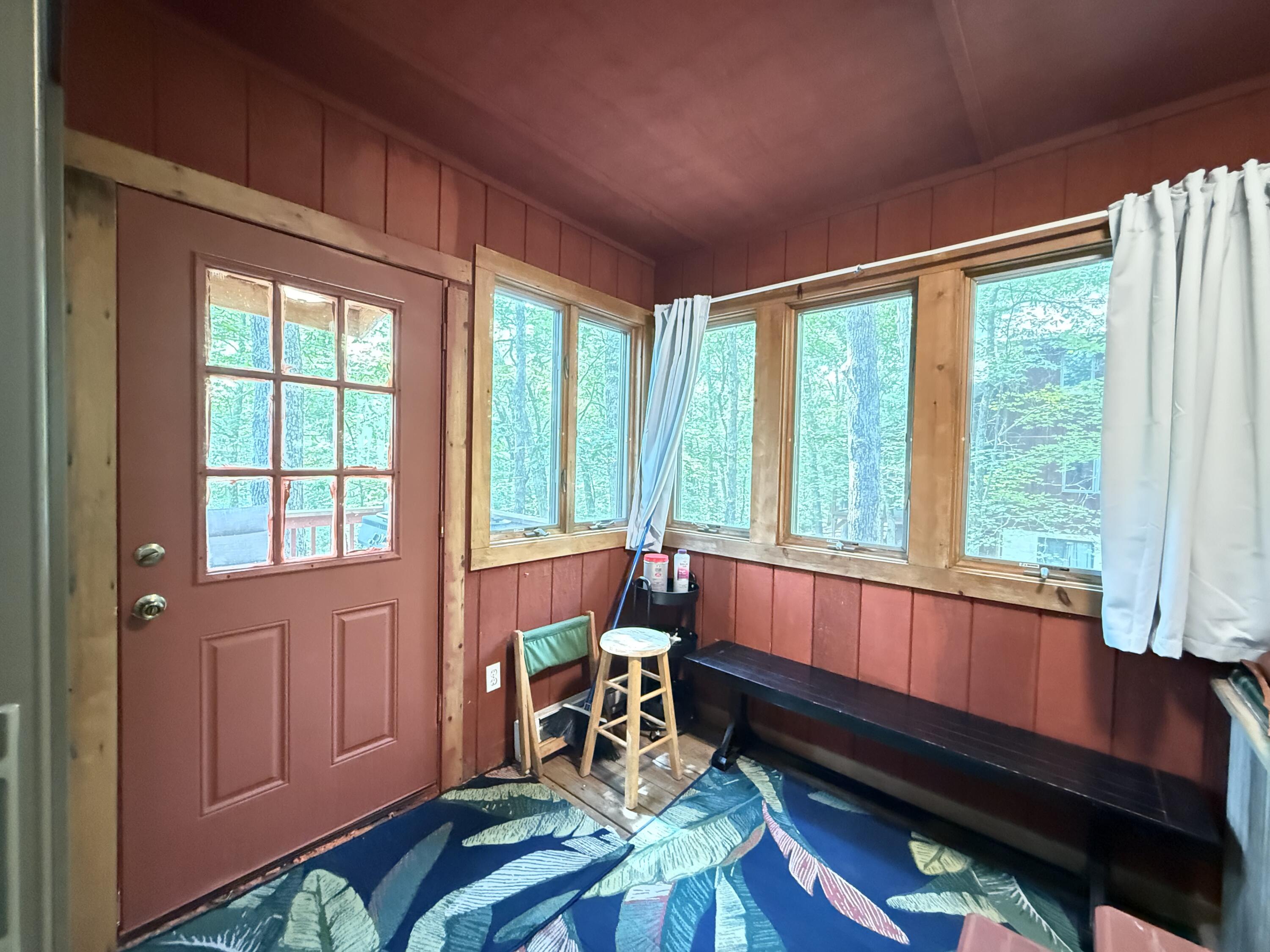 6414 Decker Road Bushkill, PA 18324 - Photo 29 of 65 a living room filled with furniture and a potted plant
