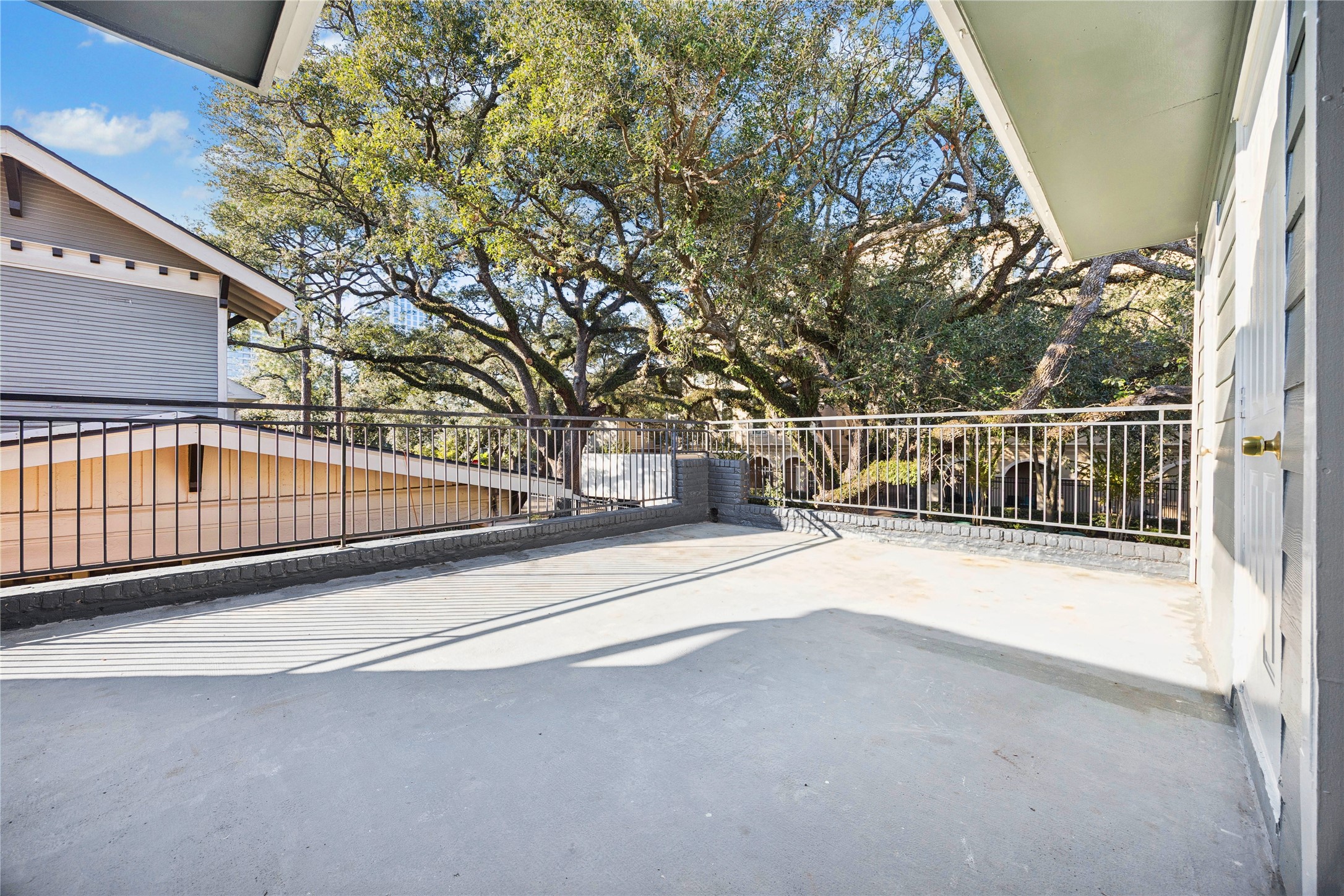 705 Harold Street, Unit 1 Houston, TX 77006 - Photo 15 of 16 a view of a house with a street