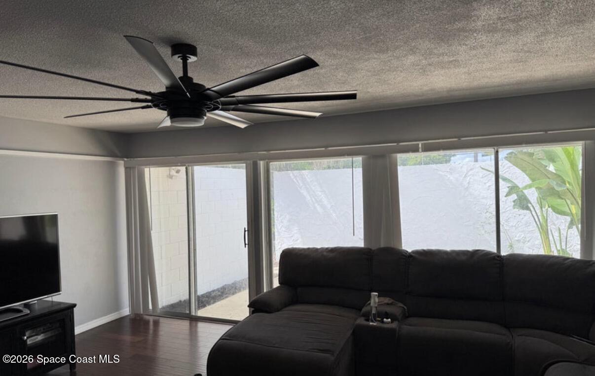 938 Brunswick Lane Rockledge, FL 32955 - Photo 19 of 21 Looking to living room from dining room