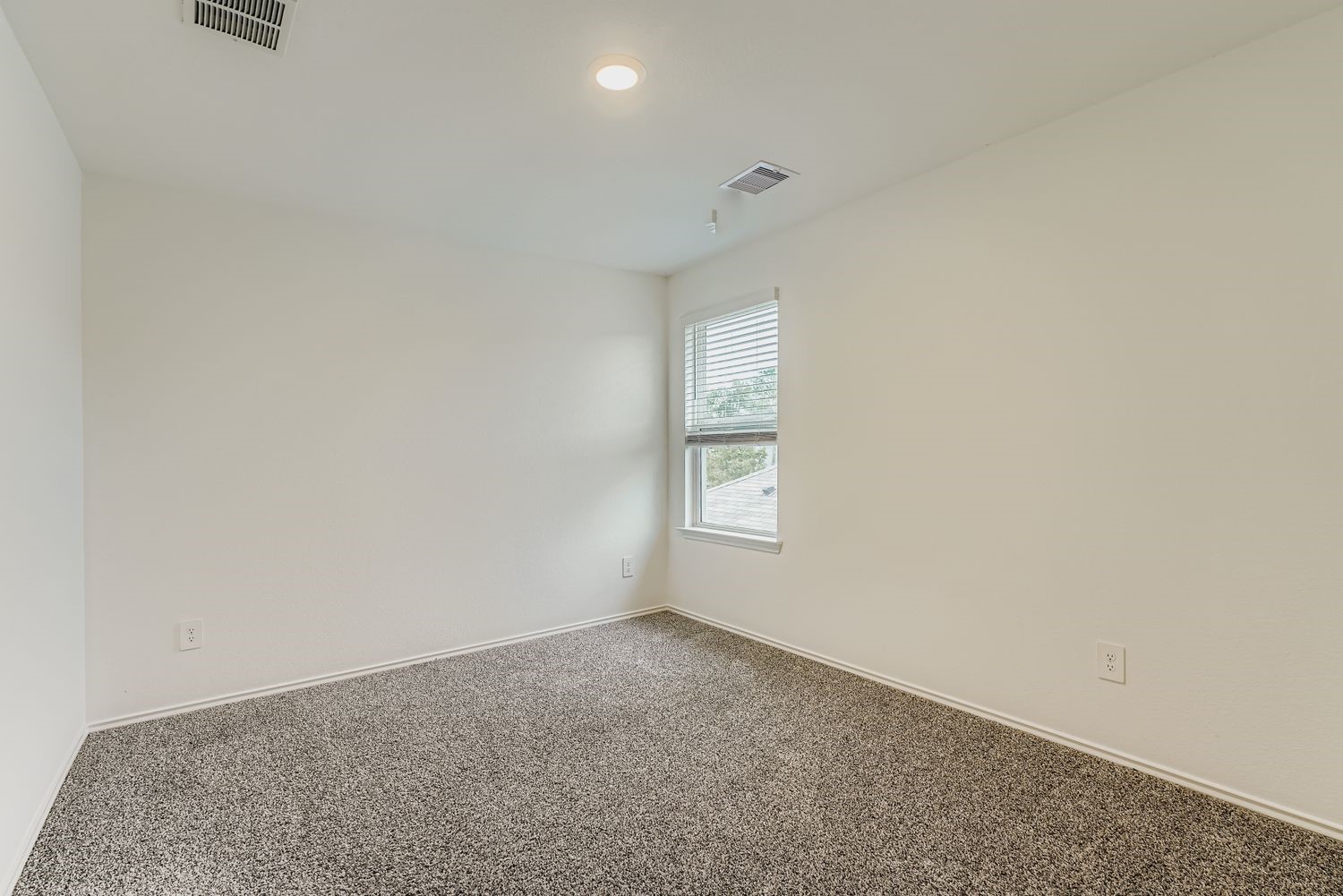 1726 Windstone Ridge Drive Houston, TX 77014 - Photo 15 of 28 an empty room with windows