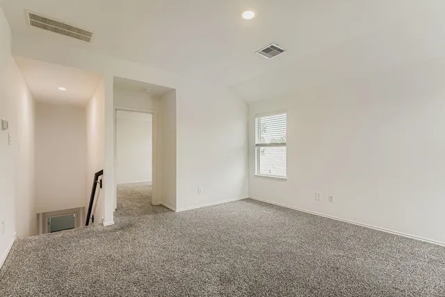 a room with a mirror and gym equipment