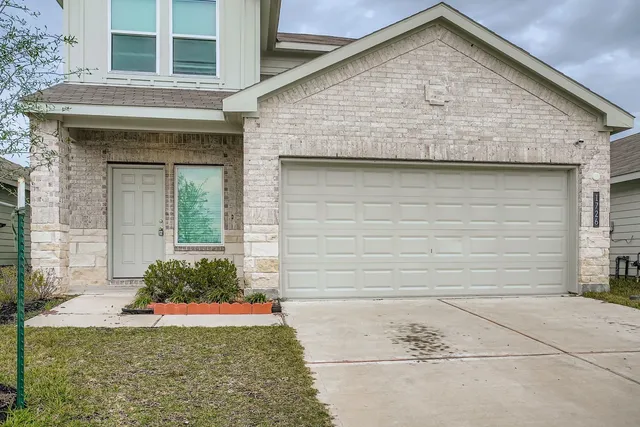 a view of kitchen with wooden floor