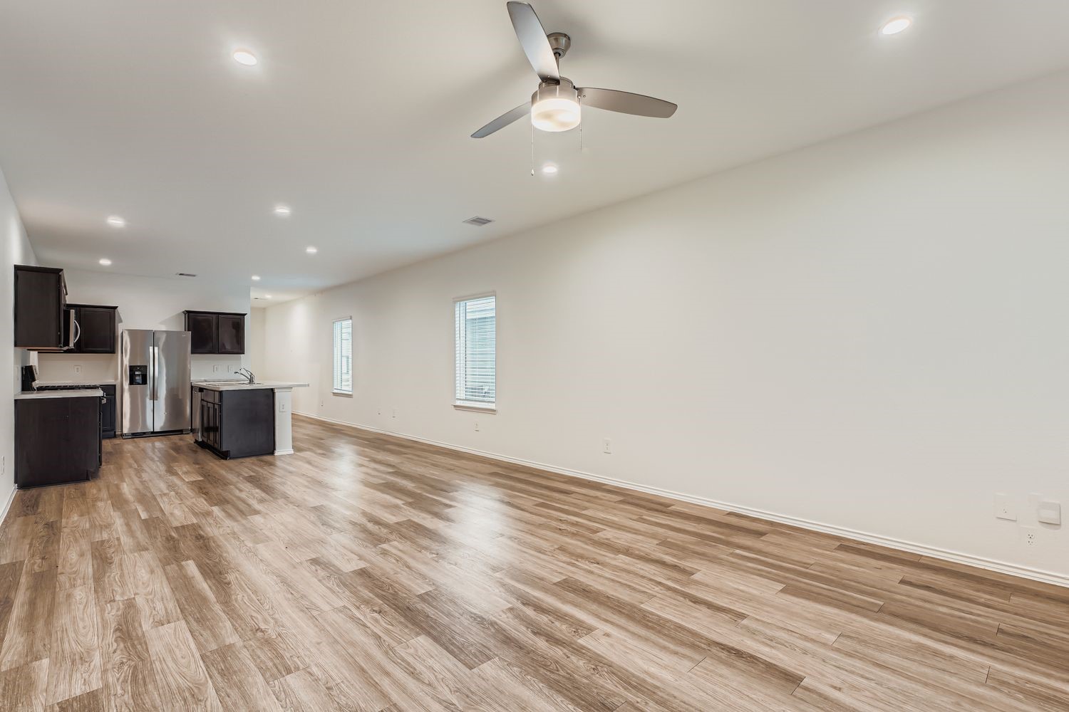 1726 Windstone Ridge Drive Houston, TX 77014 - Photo 4 of 28 a view of kitchen with wooden floor
