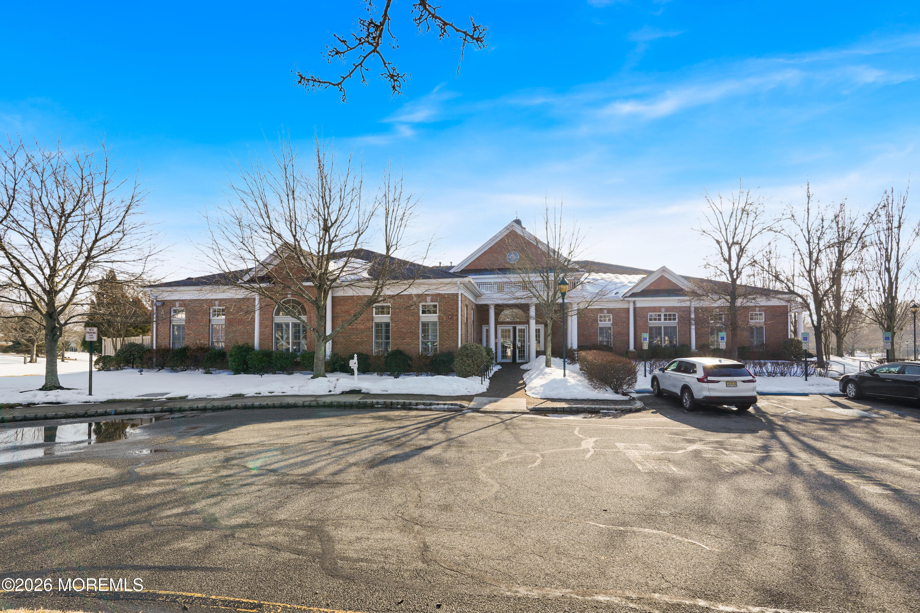 2526 Morningstar Road Manasquan, NJ 08736 - Photo 16 of 17 a front view of a house with a yard