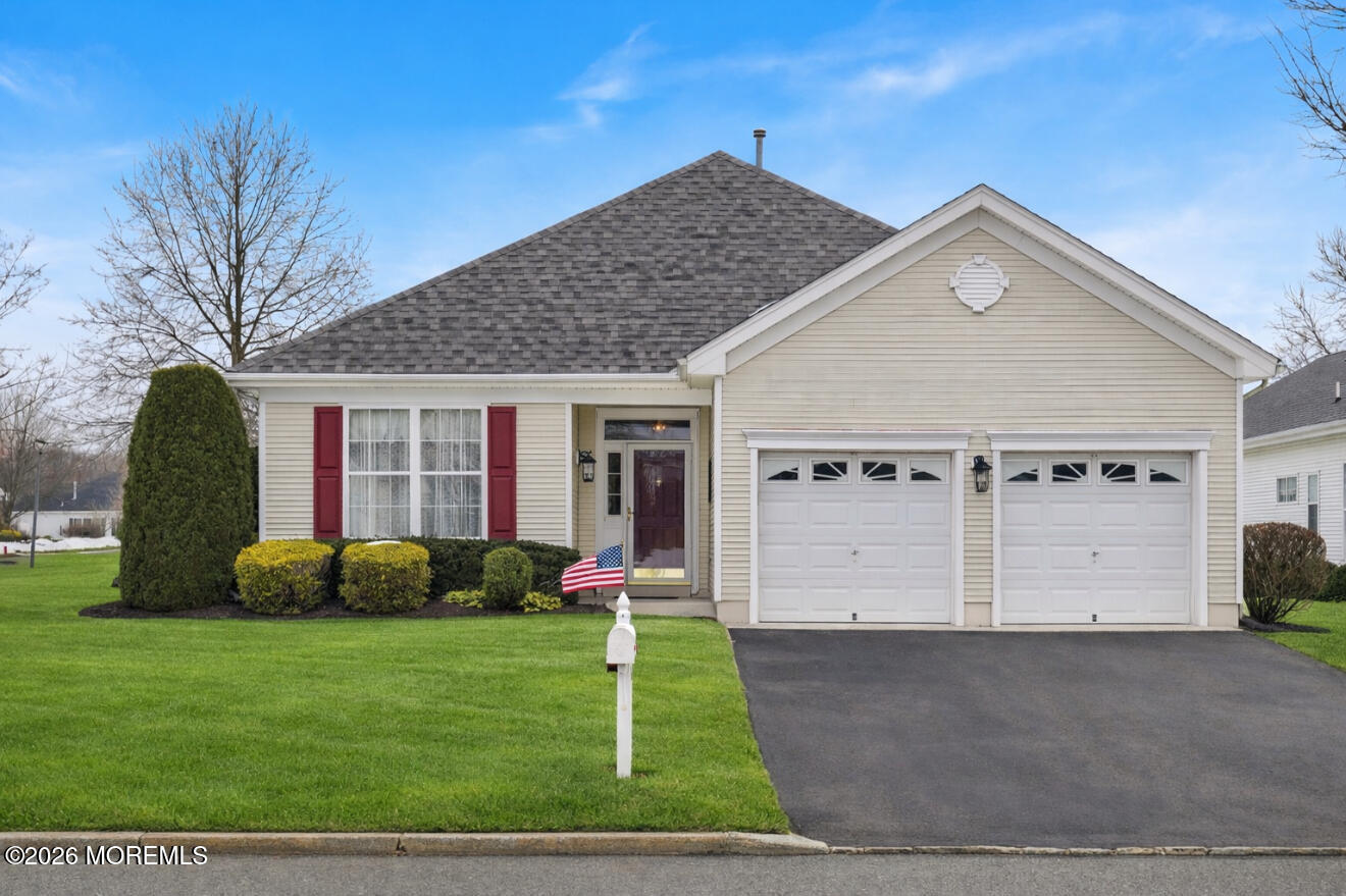 2526 Morningstar Road Manasquan, NJ 08736 - Photo 17 of 17 a front view of a house with a yard and garage