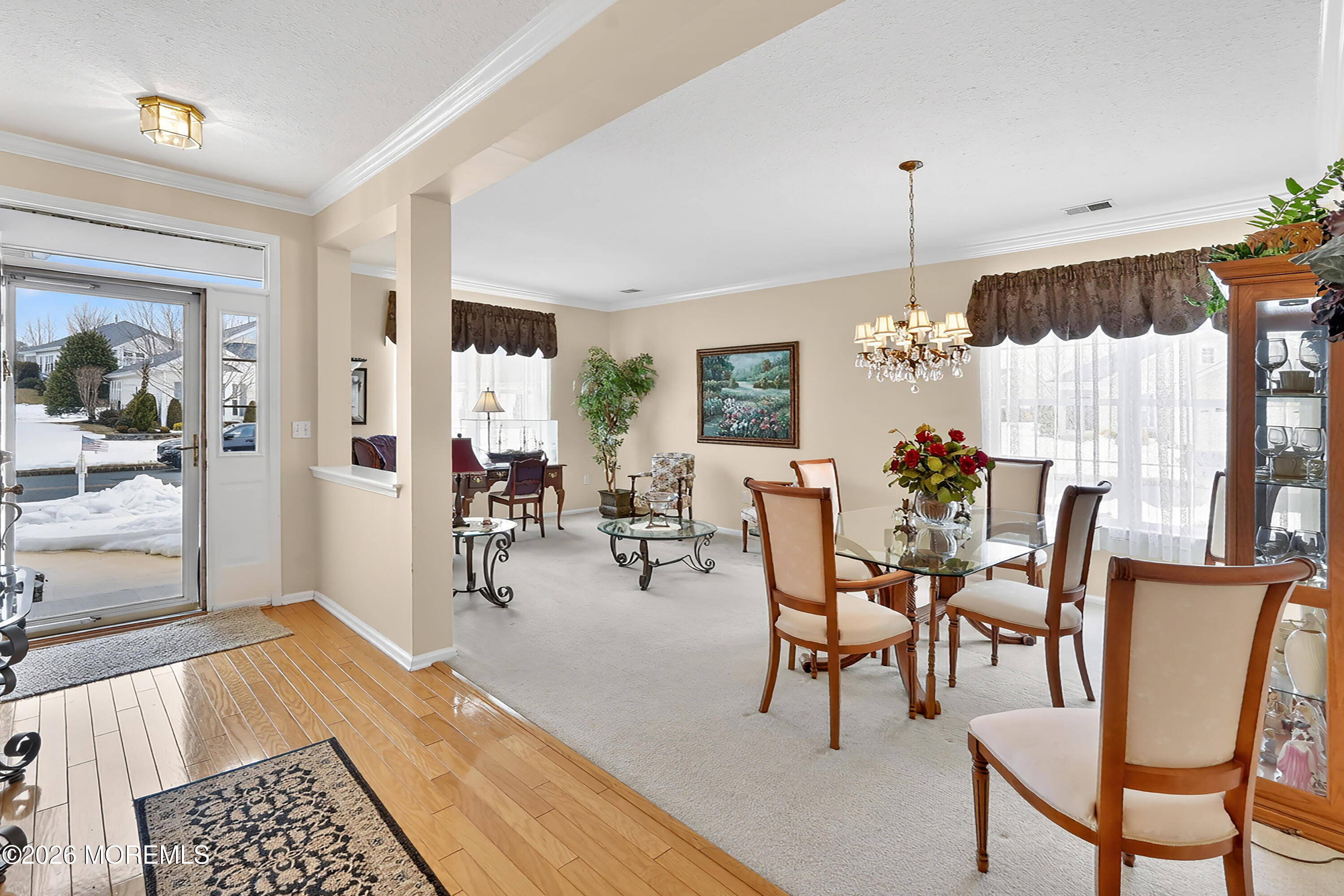 2526 Morningstar Road Manasquan, NJ 08736 - Photo 2 of 17 a view of a dining room with furniture and wooden floor