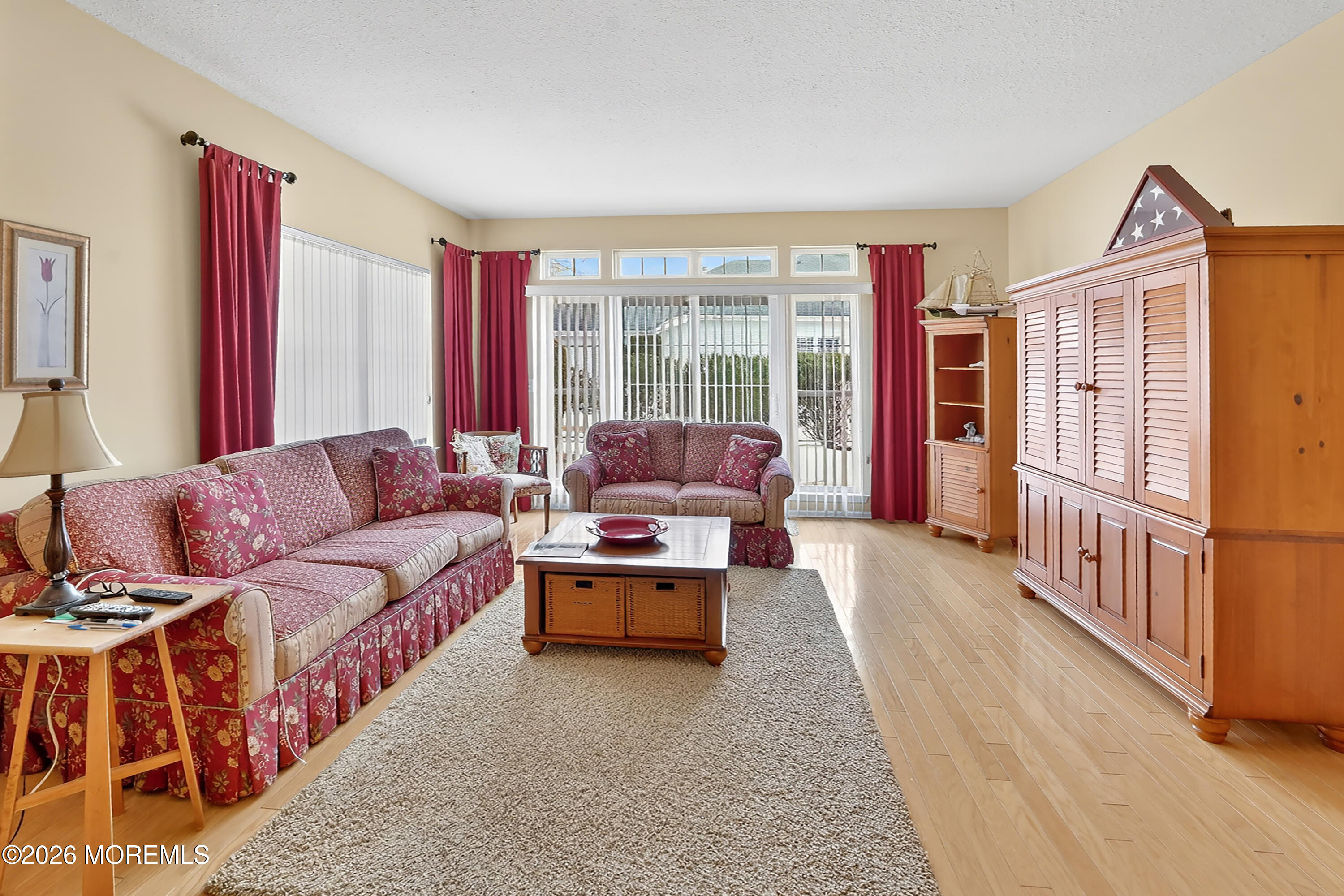 2526 Morningstar Road Manasquan, NJ 08736 - Photo 9 of 17 a living room with furniture and a large window
