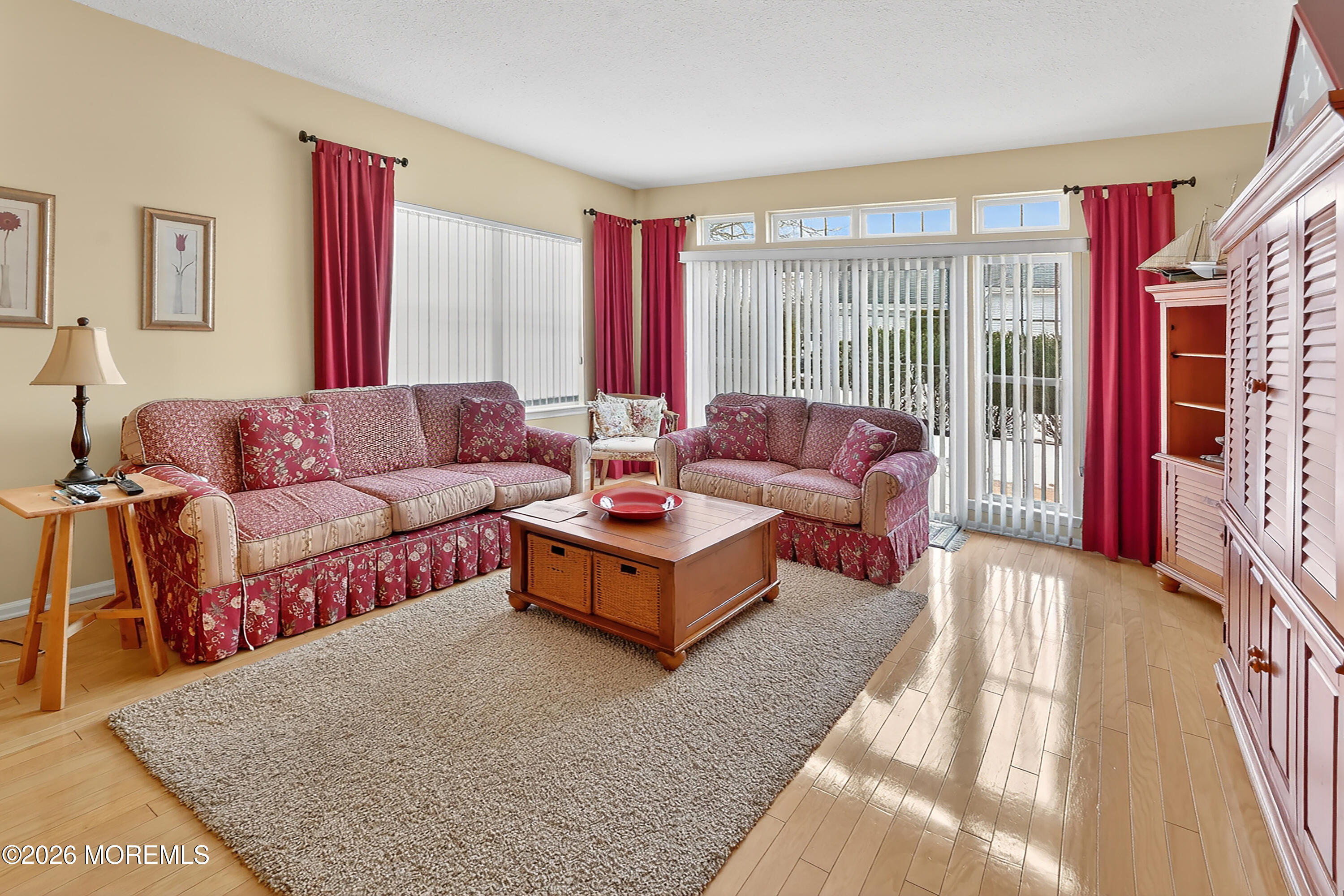 2526 Morningstar Road Manasquan, NJ 08736 - Photo 10 of 17 a living room with furniture and a large window