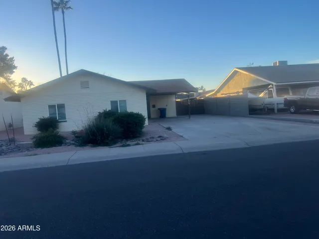 a house view with a garden space