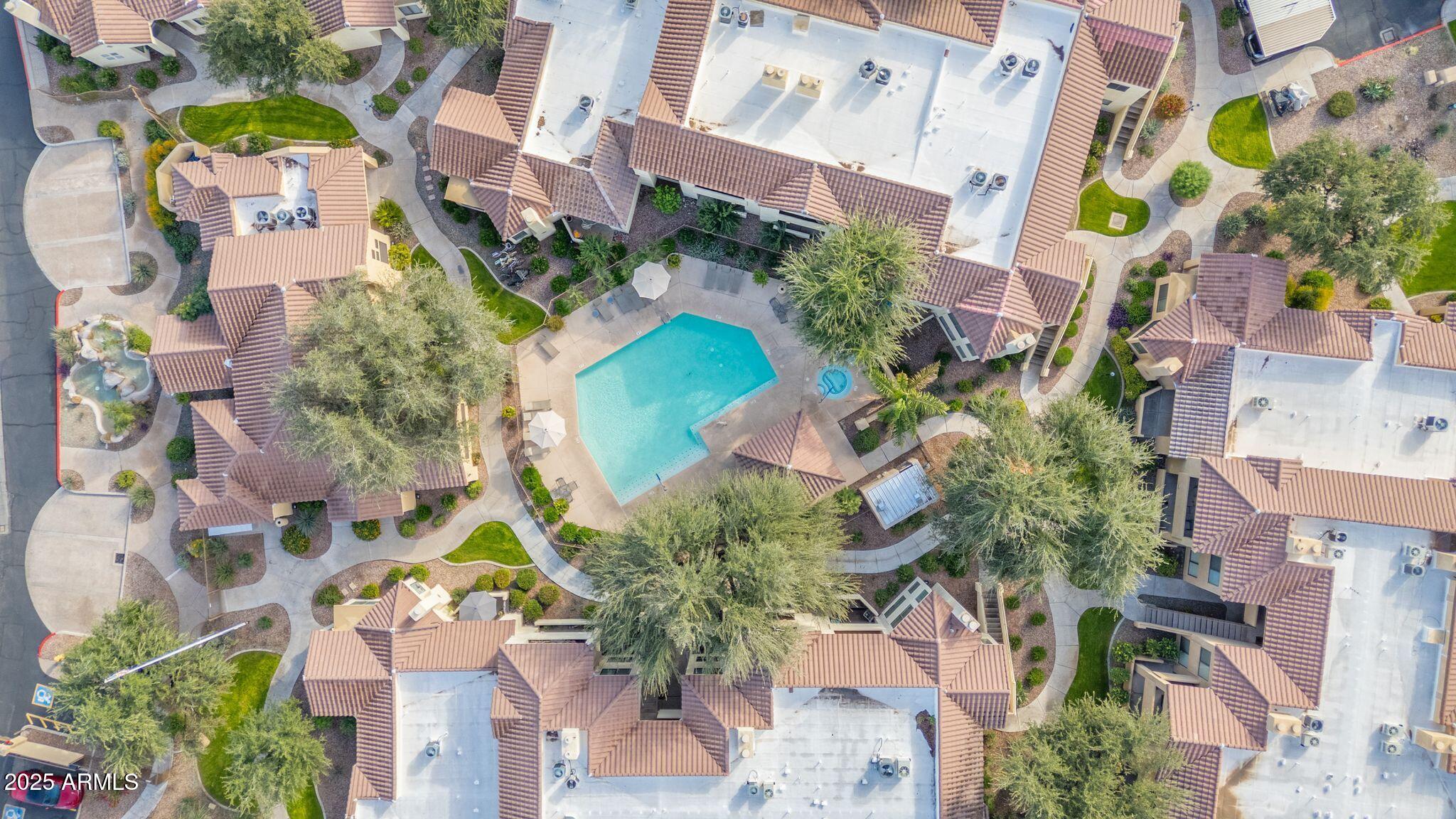 7575 East Indian Bend Road, Unit 2085 Scottsdale, AZ 85250 - Photo 23 of 30 an aerial view of residential houses with outdoor space
