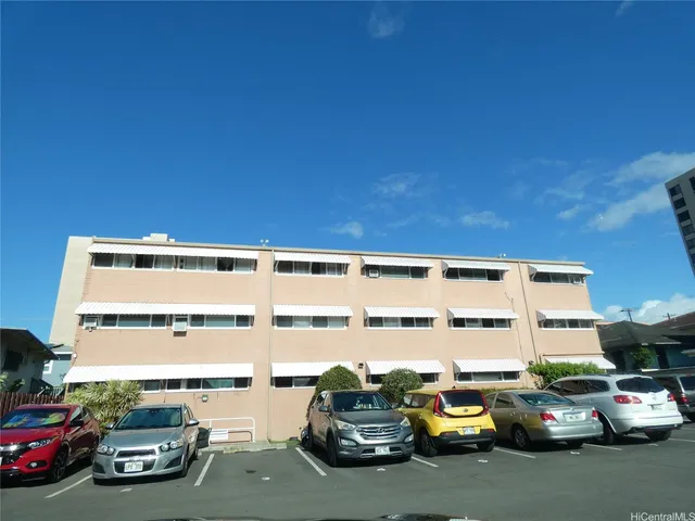 a car parked in front of a building
