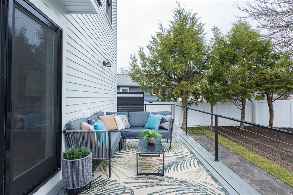 6 Gordon Road Arlington, MA 02474 - Photo 12 of 40 a view of a deck with furniture