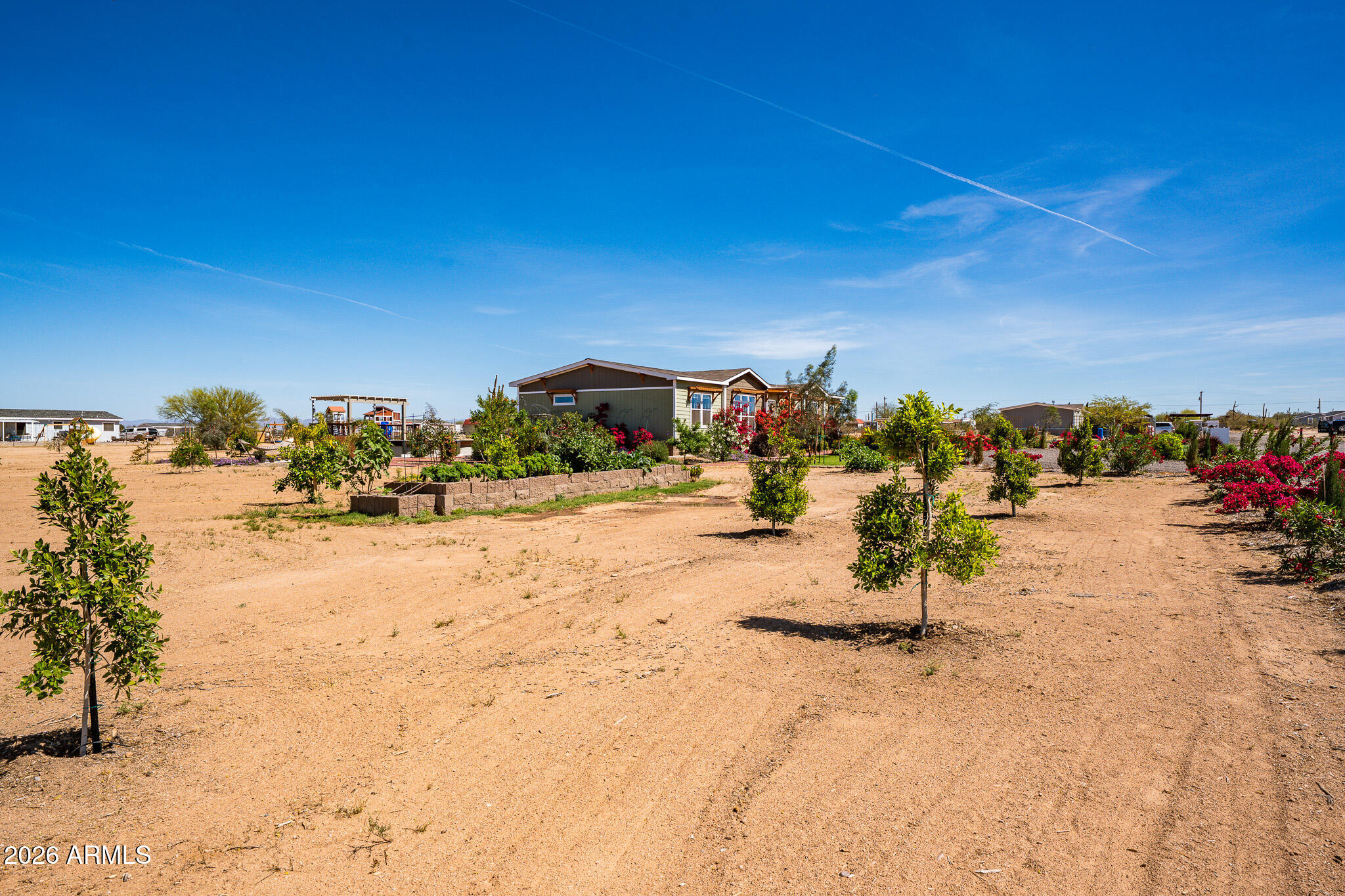 22622 East Day Spring Lane Florence, AZ 85132 - Photo 42 of 70 a view of a road with a building in the background