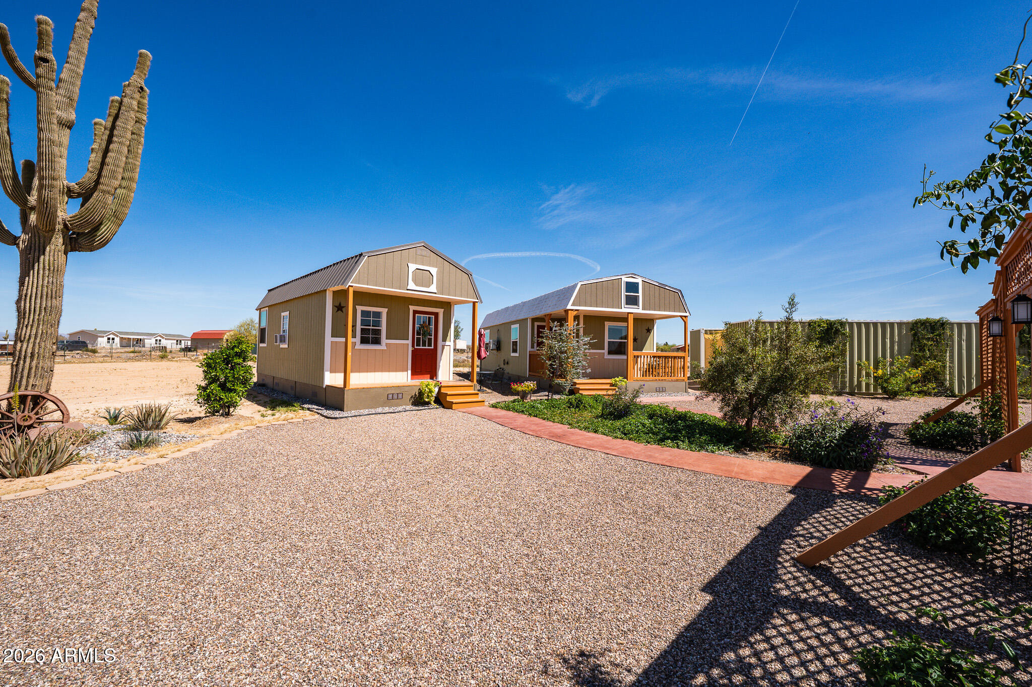 22622 East Day Spring Lane Florence, AZ 85132 - Photo 46 of 70 a front view of a house with a yard
