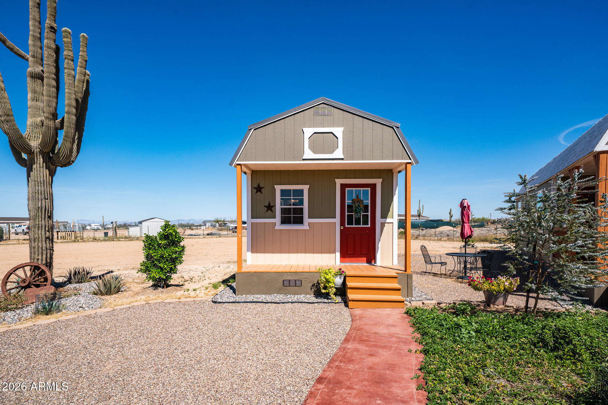 22622 East Day Spring Lane Florence, AZ 85132 - Photo 57 of 70 a front view of a house with garden