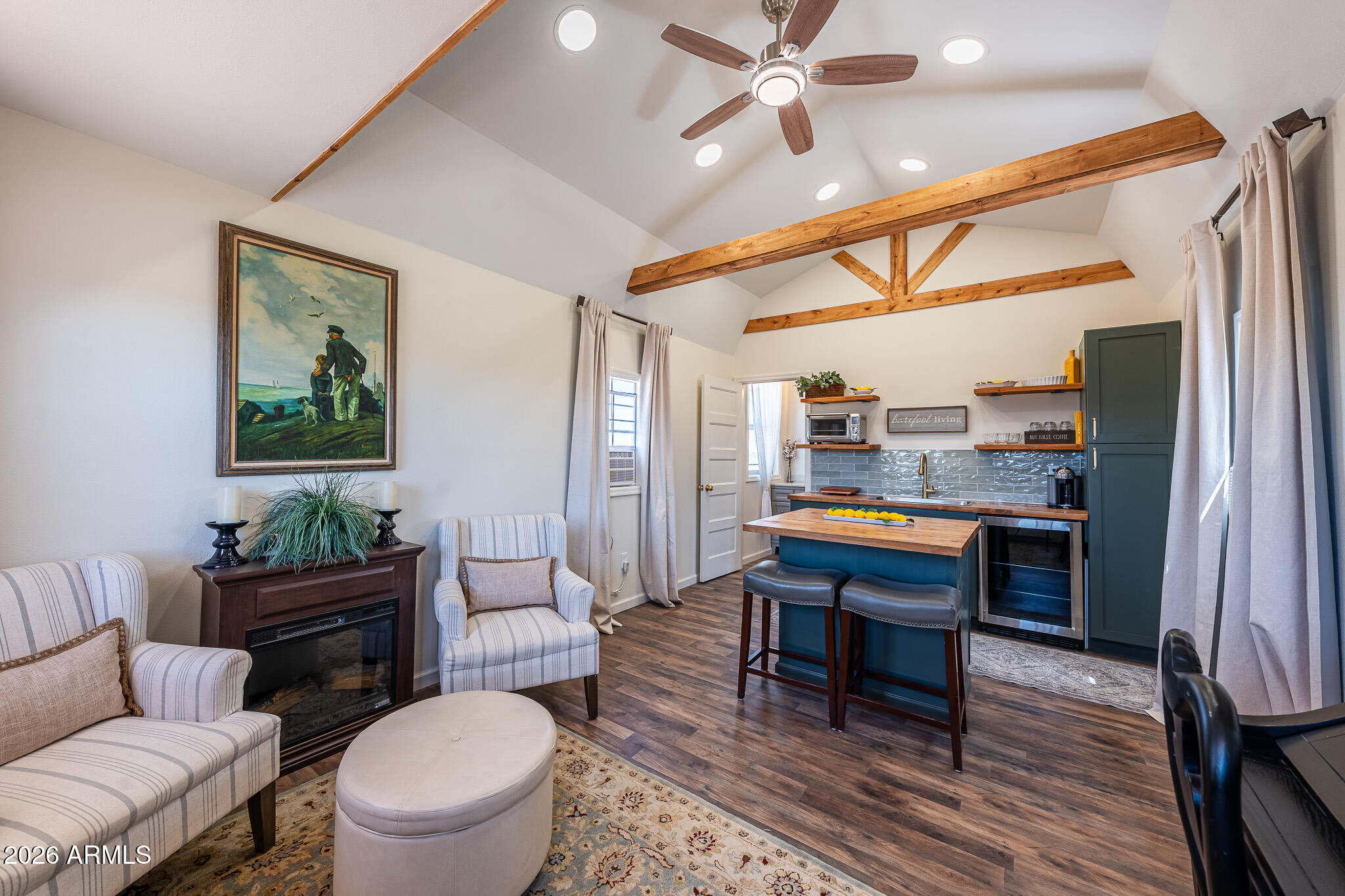22622 East Day Spring Lane Florence, AZ 85132 - Photo 61 of 70 a room with a table chairs and a wooden floor
