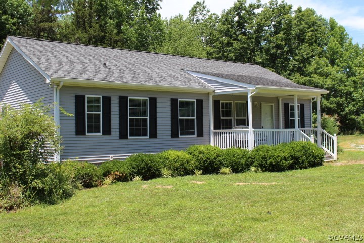 403 John Randolph Road Farmville, VA 23901 - Photo 1 of 23 a view of a house with garden and yard