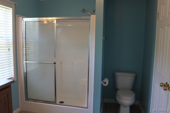 403 John Randolph Road Farmville, VA 23901 - Photo 12 of 23 a bathroom with a granite countertop toilet and a sink