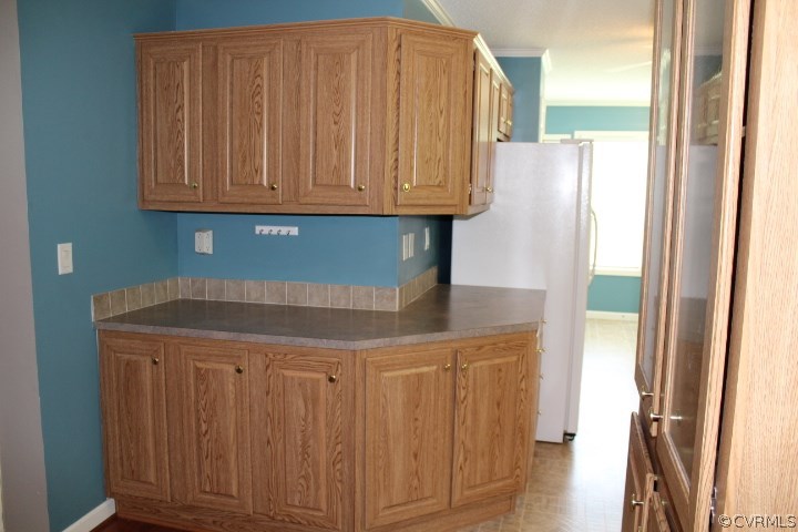 403 John Randolph Road Farmville, VA 23901 - Photo 3 of 23 a kitchen with stainless steel appliances a refrigerator and cabinets