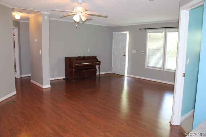 403 John Randolph Road Farmville, VA 23901 - Photo 8 of 23 a view of empty room with wooden floor and fan