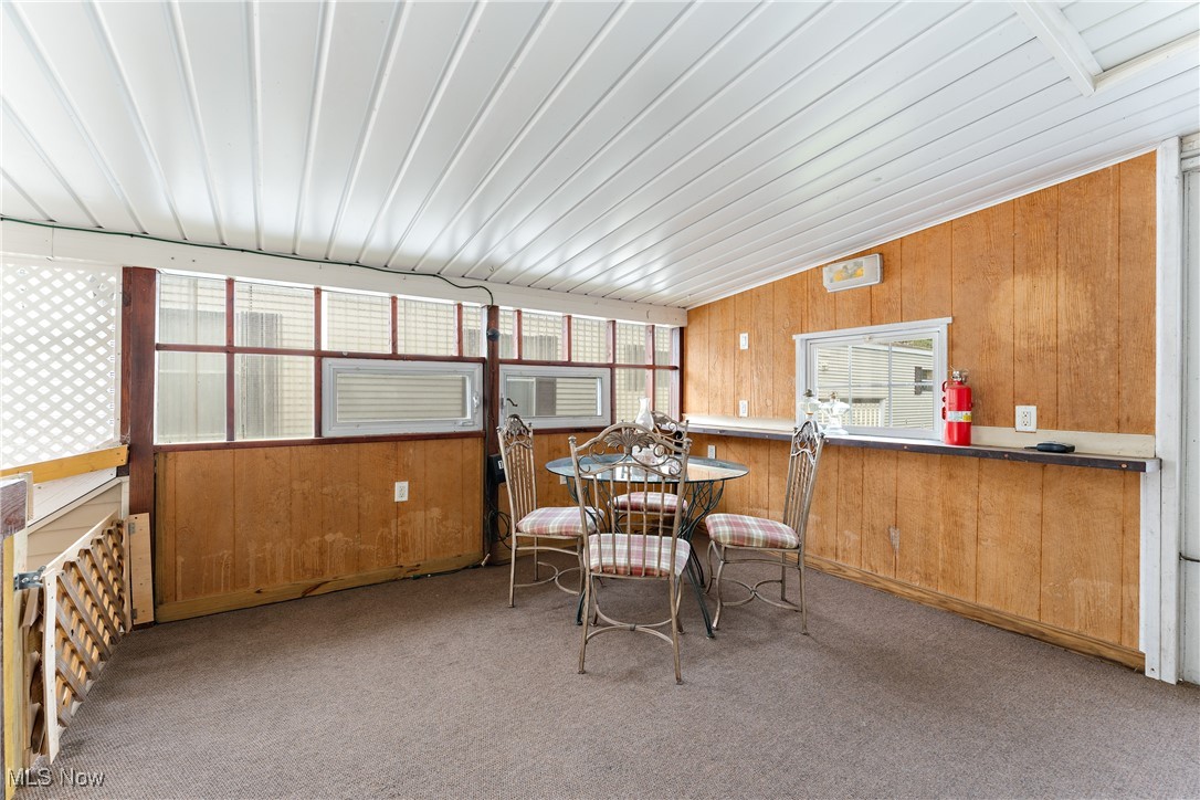 4455 Cleveland Road, Unit 6 Wooster, OH 44691 - Photo 30 of 40 Sunroom / solarium featuring lofted ceiling