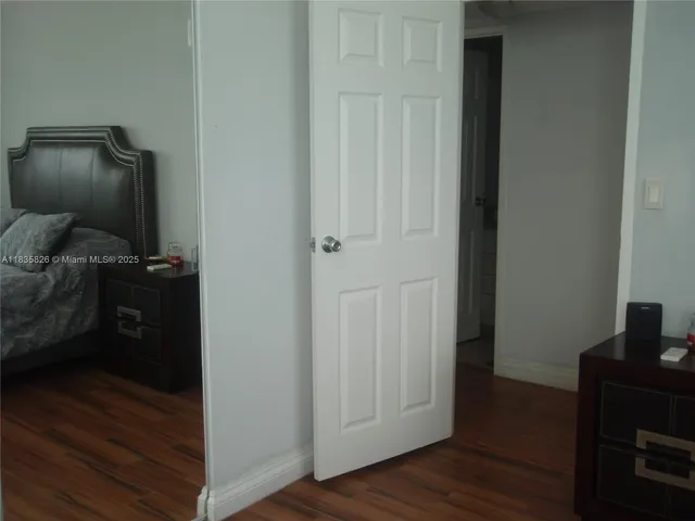 a view of a glass door and a window