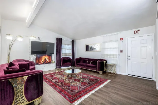 a kitchen with stainless steel appliances a refrigerator and a stove