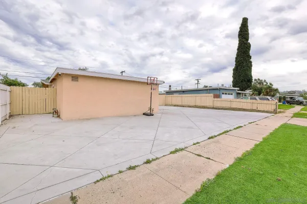 a view of a big yard next to a road