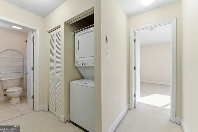 a bathroom with a toilet and a sink