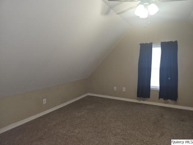 303 North Washington Street Carthage, IL 62321 - Photo 19 of 25 a view of an empty room with a window