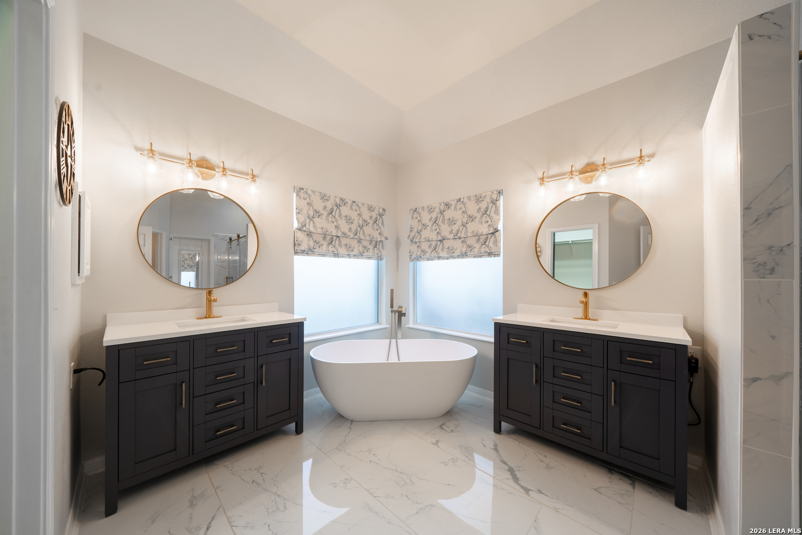 13034 Wild Heart Helotes, TX 78023 - Photo 22 of 49 a bathroom with a toilet a sink and a mirror