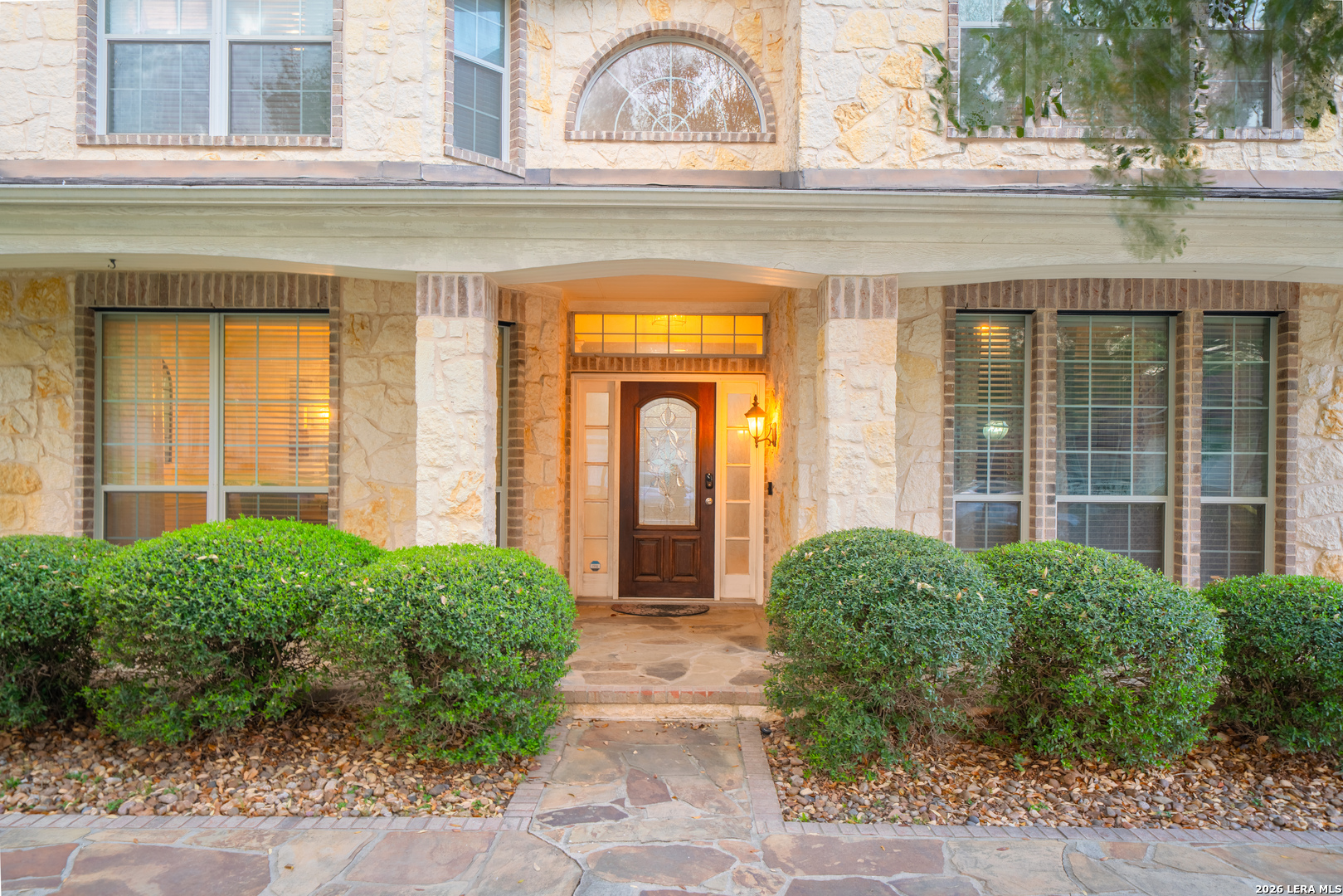 13034 Wild Heart Helotes, TX 78023 - Photo 4 of 49 a view of a entrance of the building