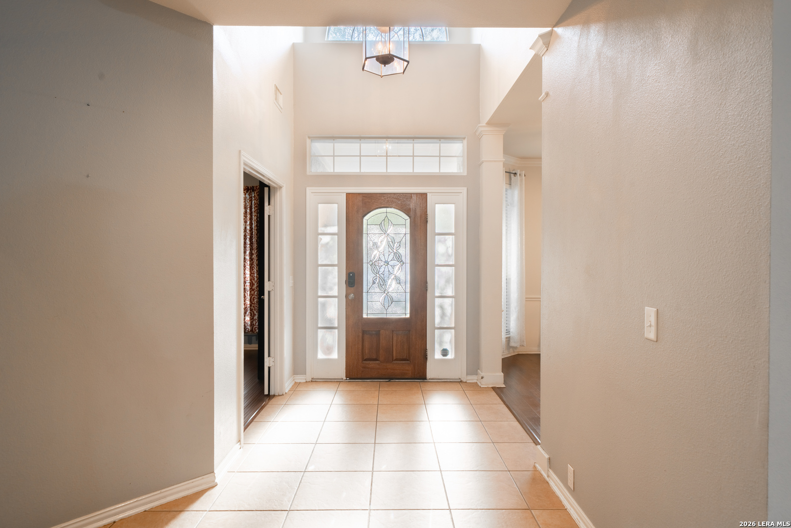 13034 Wild Heart Helotes, TX 78023 - Photo 5 of 49 a view of a entryway door with a hallway