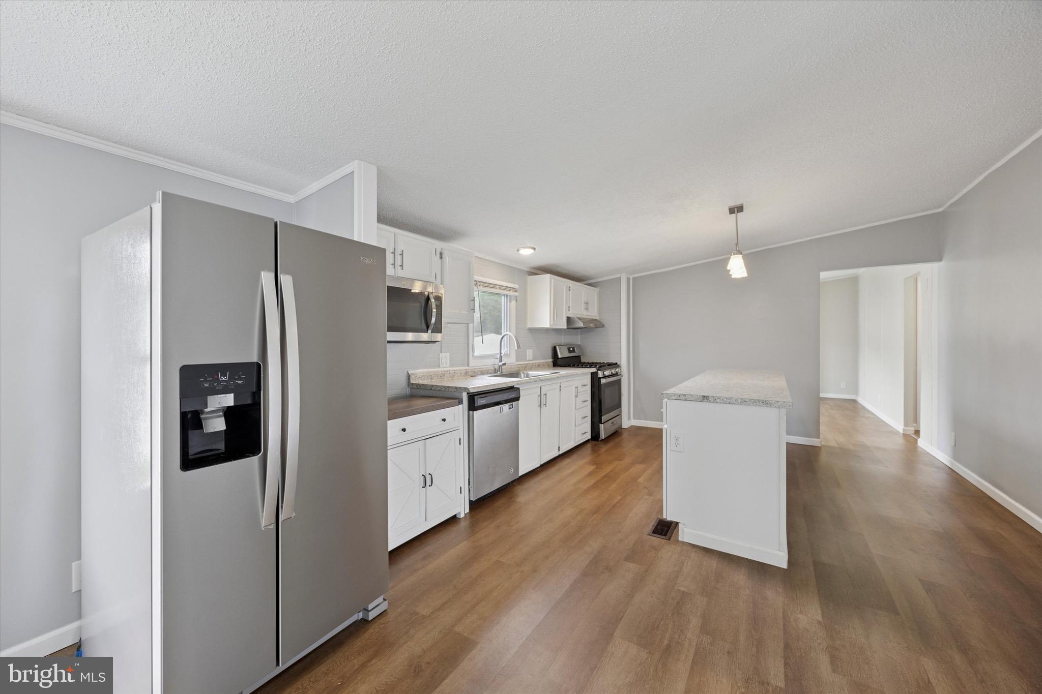 528 Vincent Lane, Unit 103 Bear, DE 19701 - Photo 6 of 16 Updated Kitchen with New Island