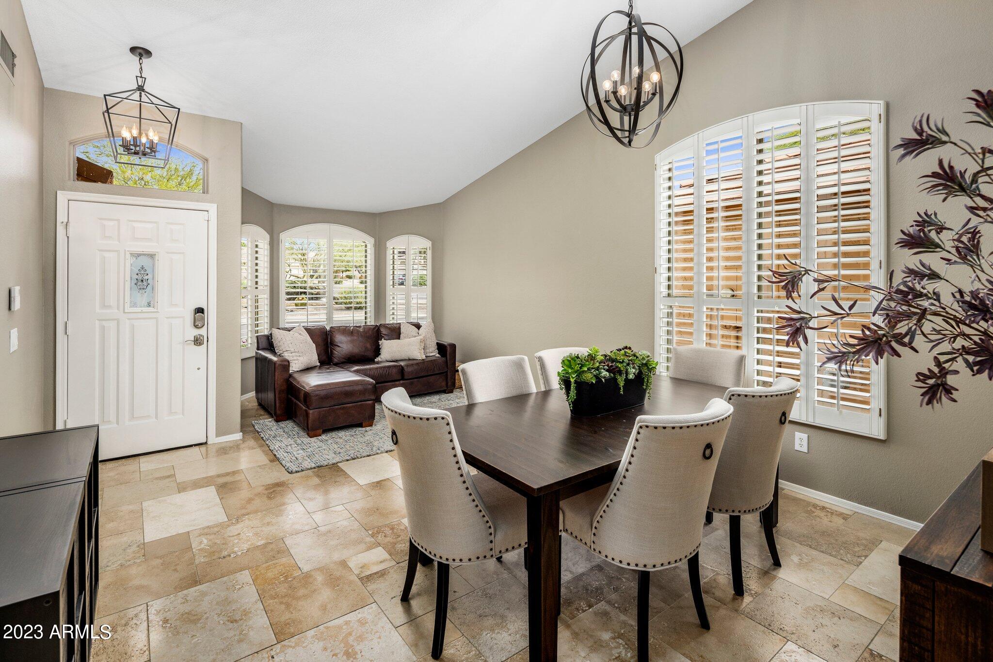 4527 East Gatewood Road Phoenix, AZ 85050 - Photo 7 of 33 Formal Dining and Living Room
