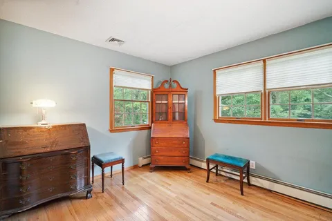 a room with furniture and a window