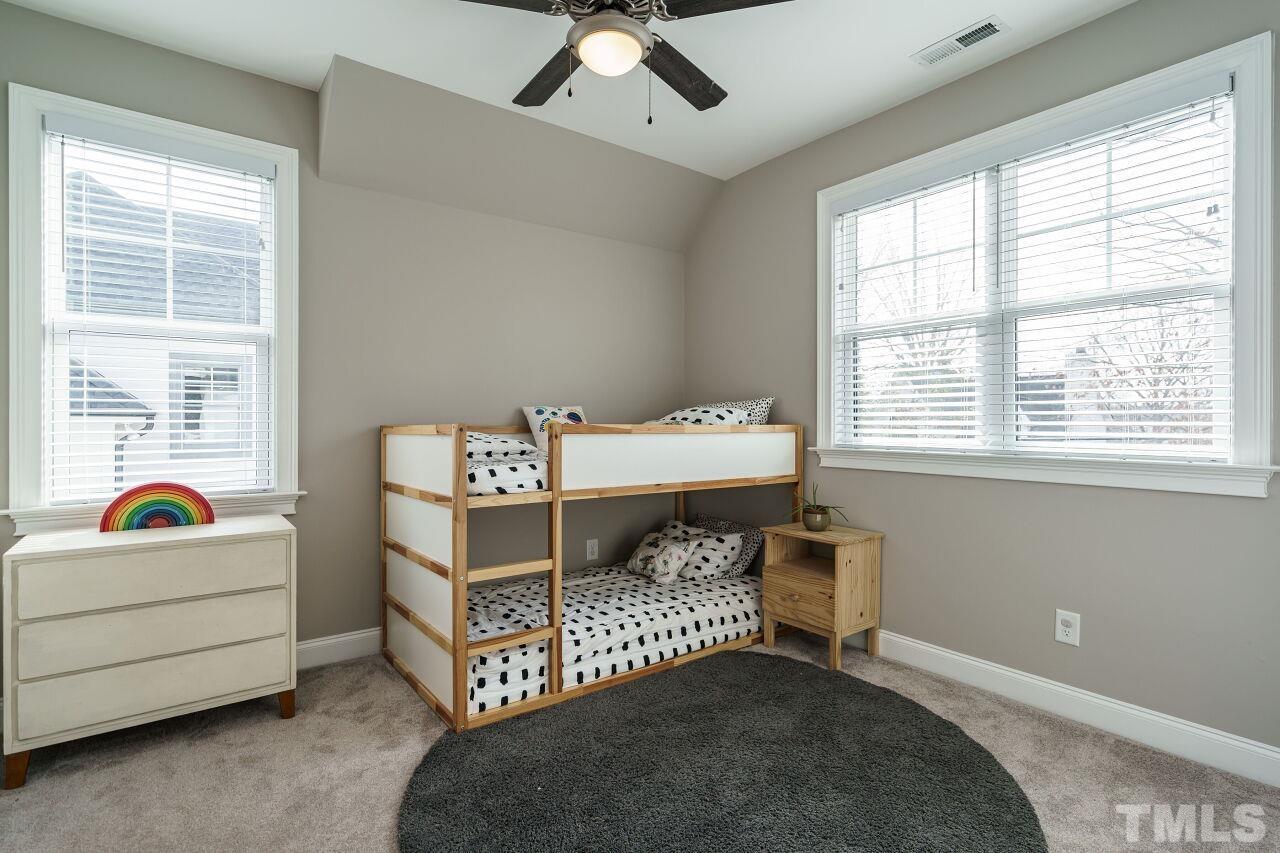 203 Georgetown Road Raleigh, NC 27608 - Photo 16 of 35 a bedroom with a bed and a window